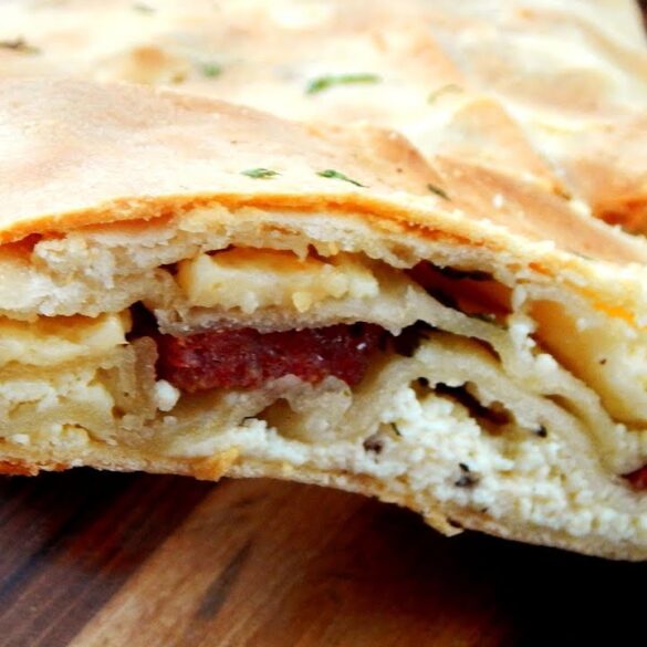 scaccia siciliana longaniza queso ricotta