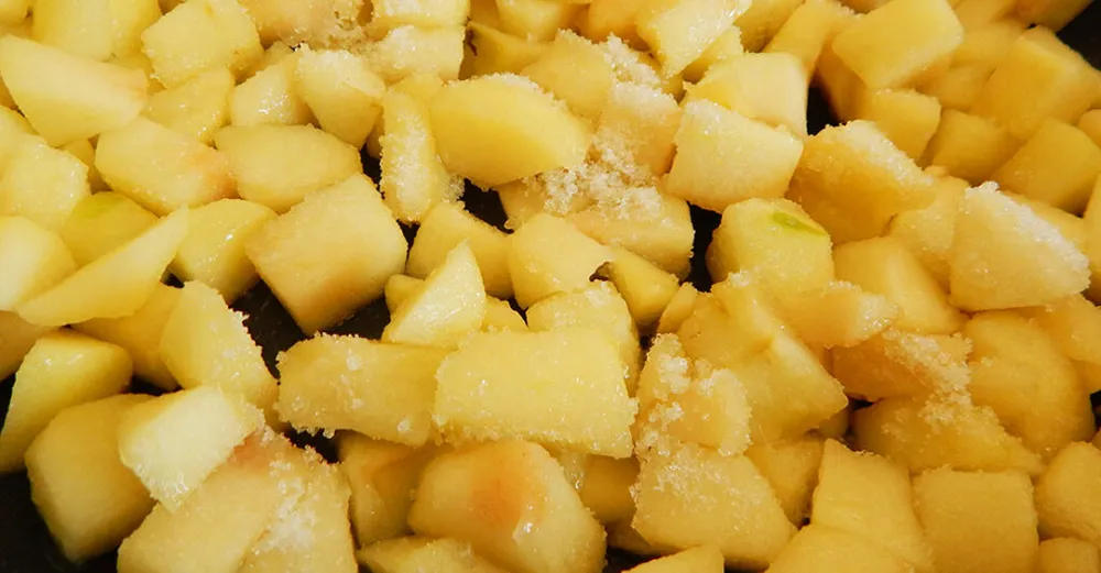 manzana con azúcar