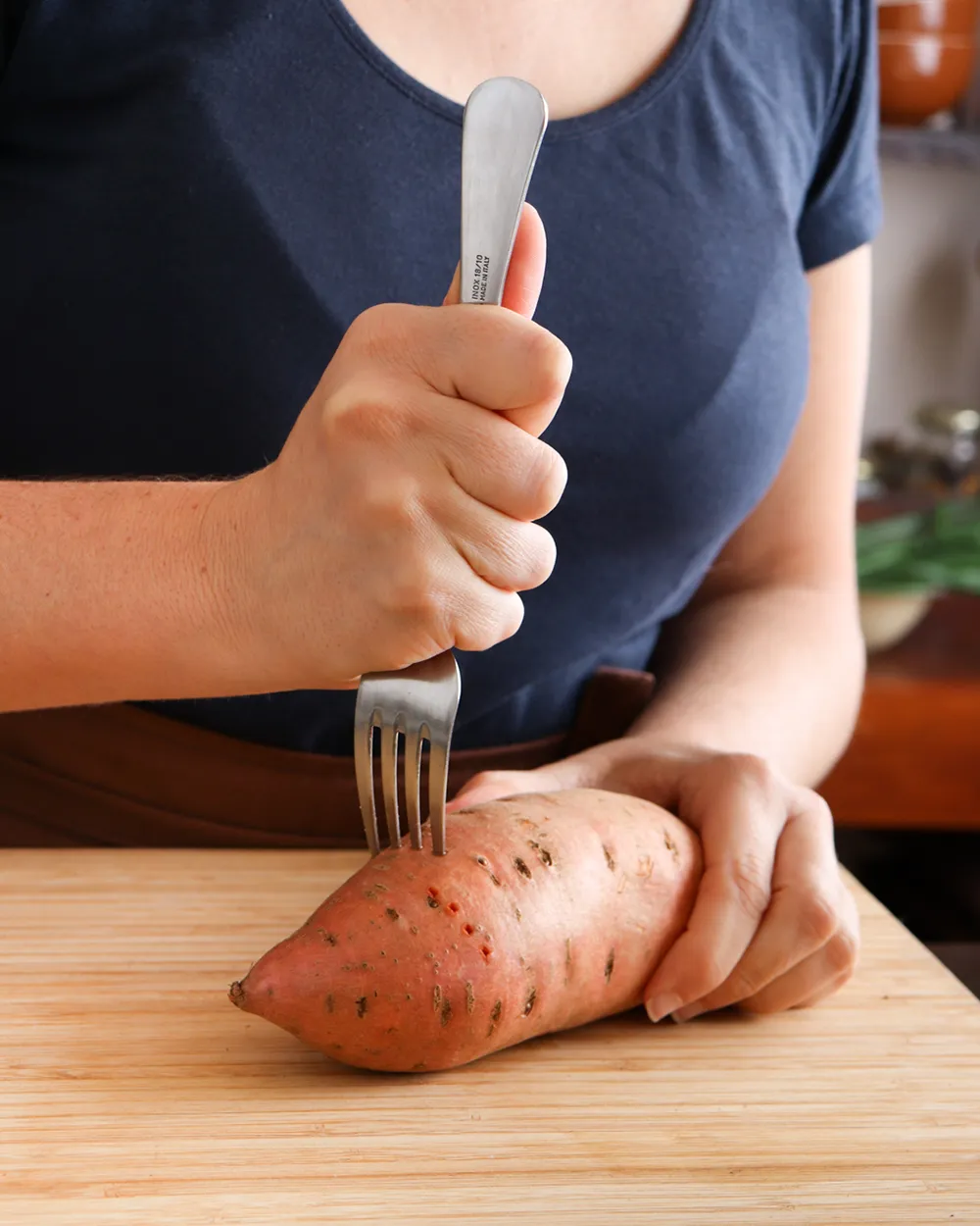 pinchar boniato con tenedor