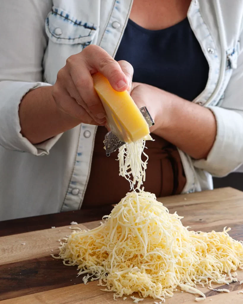 rallar quesos para fondue